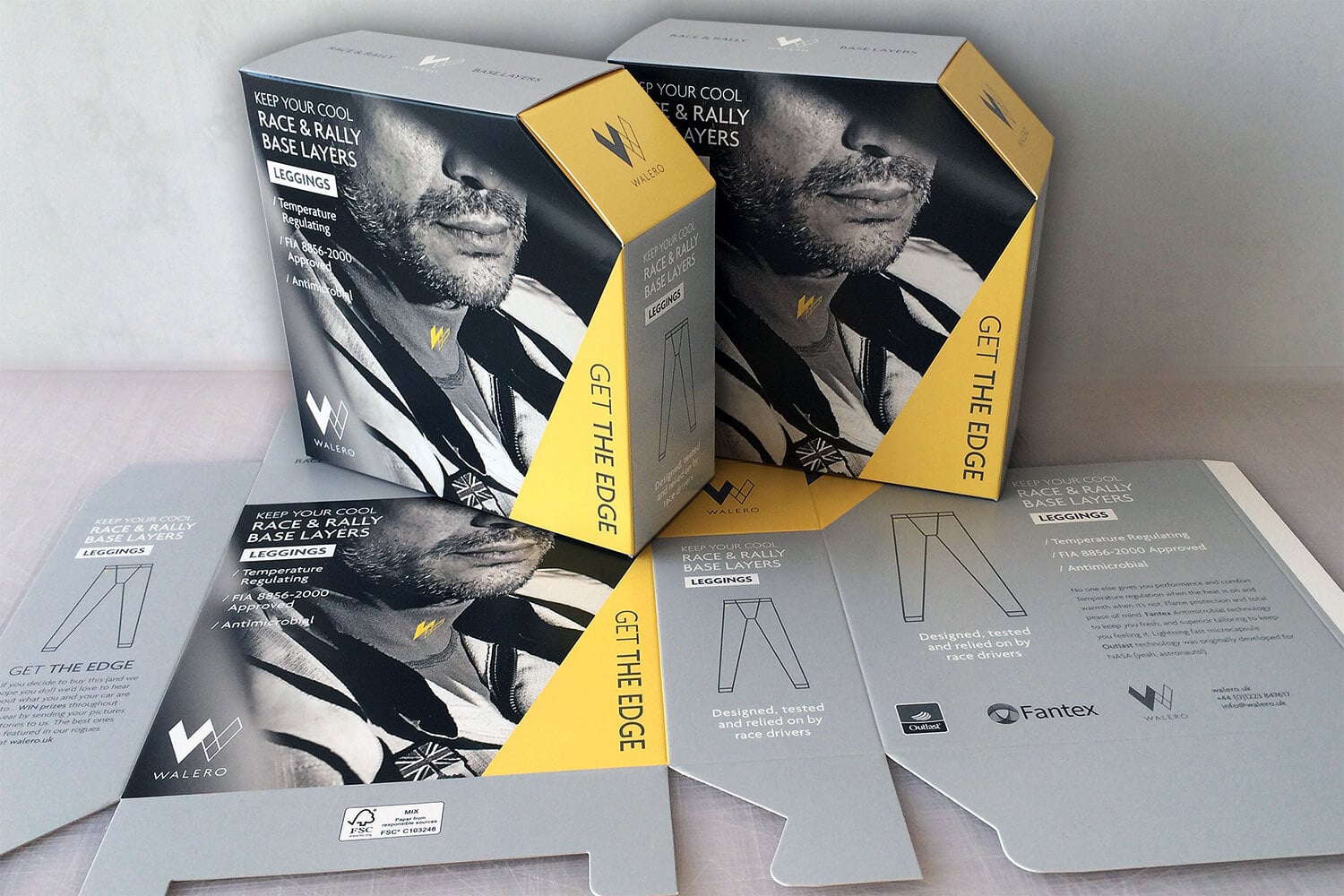 Close up of Walero box showing a full bleed resting above the packaging net cutout